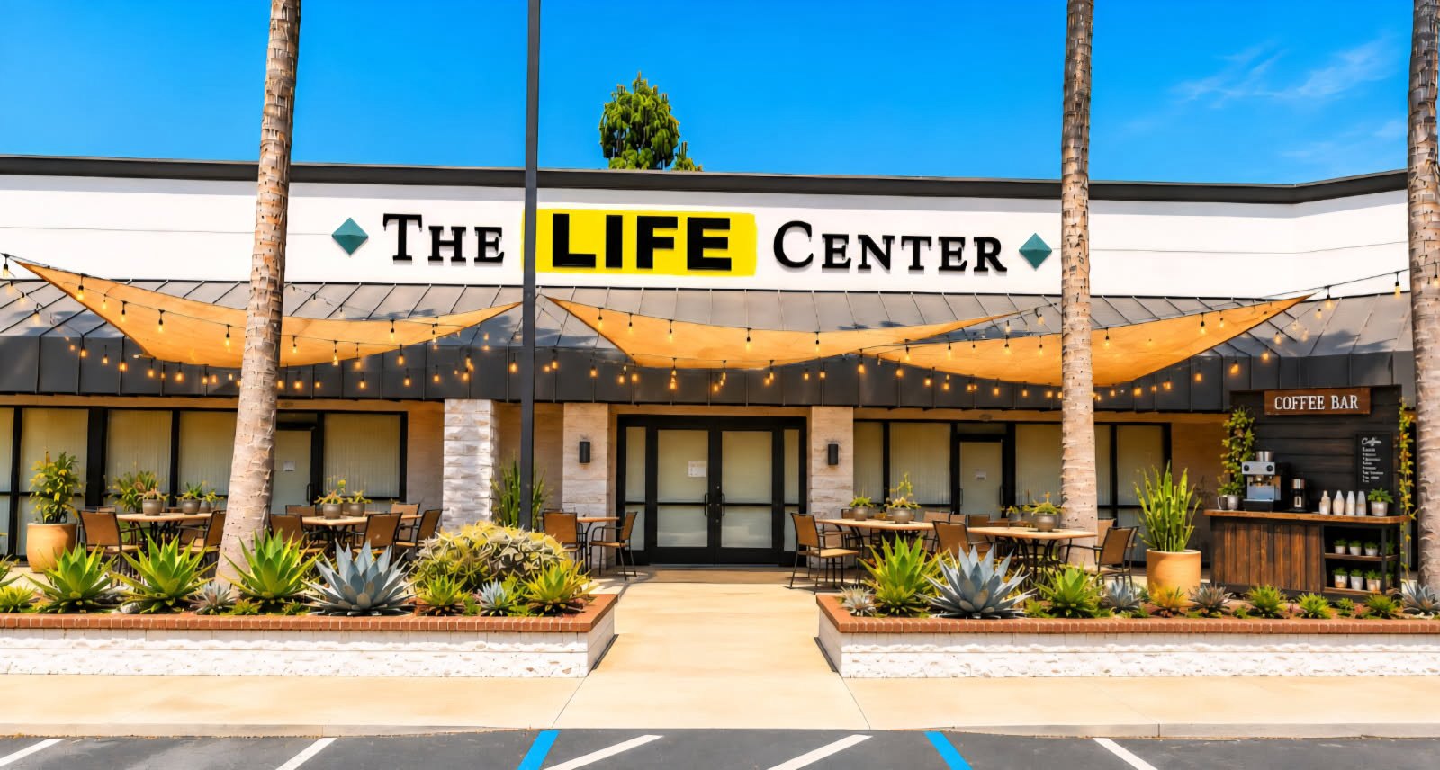 Front entrance of The Life Center with signage